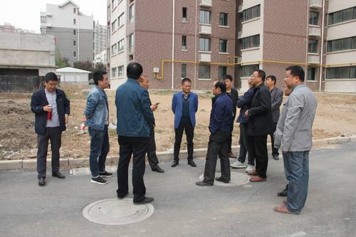 銅煤公司承建的銅煤2#小區(qū)水仙居5、6、7、8#樓順利通過竣工驗收